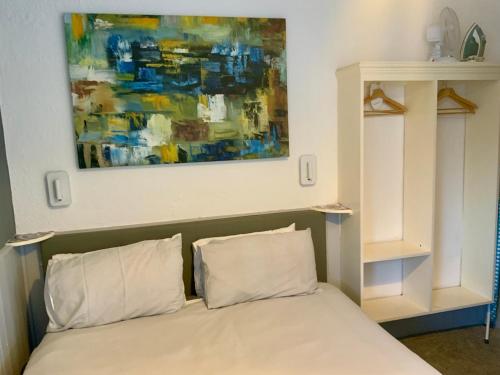Cama o camas de una habitación en Bromptons