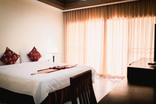 Łóżko lub łóżka w pokoju w obiekcie Panya Resort Koh Samui