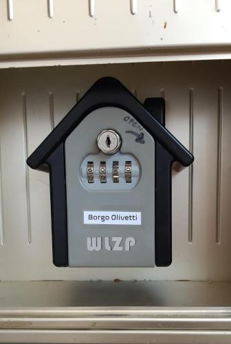 a close up of an oven with its door open at Apartment "Borgo Olivetti" in Ivrea