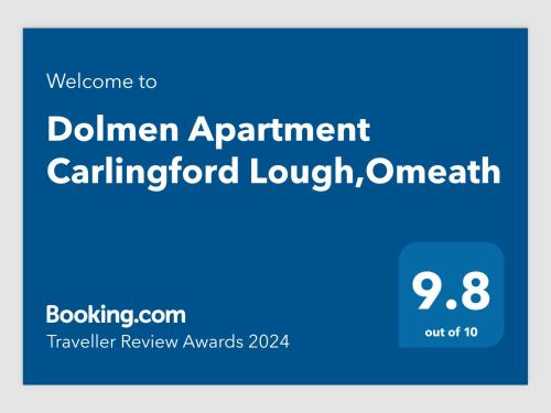 Captura de pantalla de una bienvenida a la página web de divulgación de Dollarham apartment carutherforhijht en Dolmen Apartment Carlingford Lough,Omeath, en Ó Méith