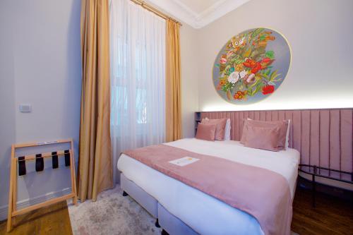 Una cama o camas en una habitación de Ayramin Exclusive Hotel - Special Category
