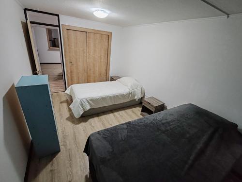 Postel nebo postele na pokoji v ubytování Departamento Frente al Casino Luckia 3H 2B