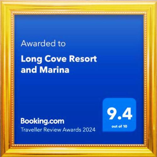 a framed picture of a long cove resort and marina at Long Cove Resort and Marina in Charlotte