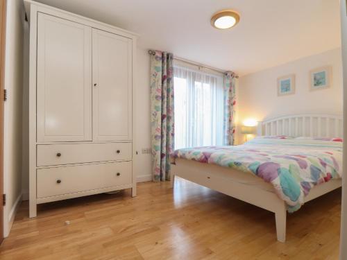 Una cama o camas en una habitación de Little Fernleigh