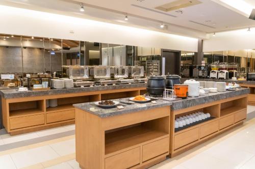 Kuhinja oz. manjša kuhinja v nastanitvi Green Hotel - Tea Way