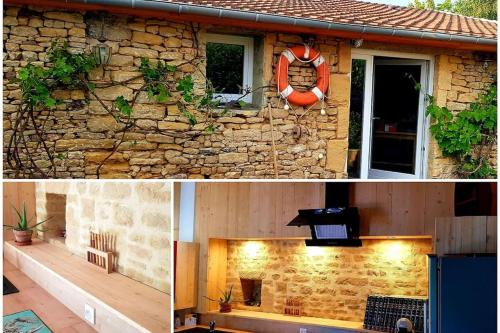 a stone house with a fireplace and a stone wall at L'Ancre du Bessin - Proximité Bayeux et plages du débarquement - D-DAY - Spa en option - Accessible PMR in Saint-Vigor-le-Grand