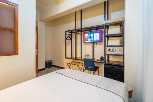 Joint Boutique Hotelにあるベッド