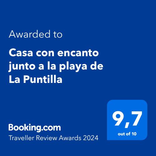 a screenshot of a cell phone with the text awarded to casa con encanta at Casa con encanto junto a la playa de La Puntilla in El Puerto de Santa María