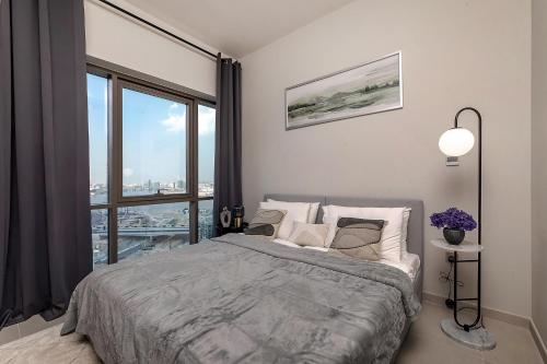 Postel nebo postele na pokoji v ubytování Luxury apartments at Vida Residences