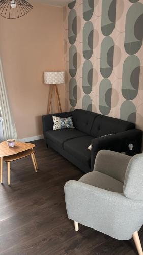Posezení v ubytování L'appartement de Julie