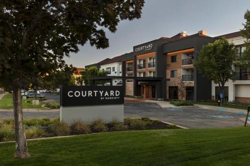 a sign in front of a building at Courtyard Salt Lake City Layton in Layton