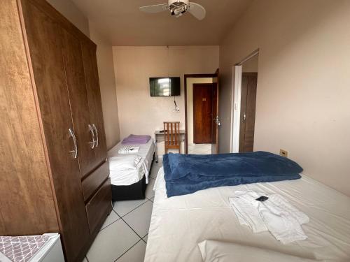 Postel nebo postele na pokoji v ubytování HOTEL Rafael