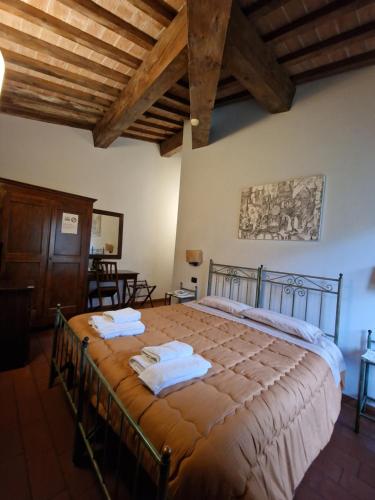 Hotel Ristorante Casa Volpiにあるベッド