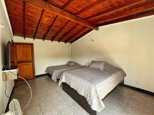 Cama o camas de una habitación en Casa Malibu