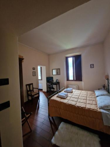 Hotel Ristorante Casa Volpiにあるベッド