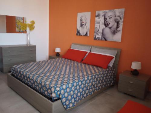Postel nebo postele na pokoji v ubytování Casa Vacanze di Alex