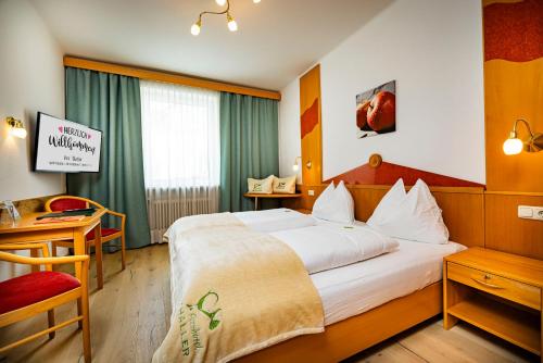 Postel nebo postele na pokoji v ubytování Der Thaller - Wirtshaus - Restaurant - Hotel