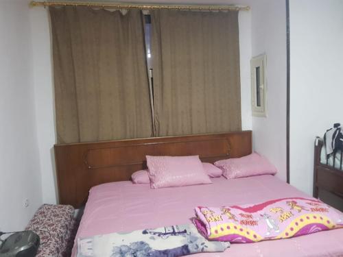 Postel nebo postele na pokoji v ubytování Sasha House