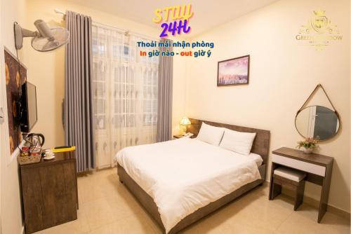 Giường trong phòng chung tại Green Meadow Dalat Hotel - STAY24H CITYVIEW