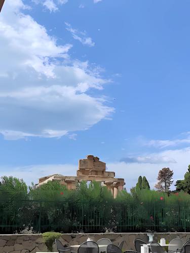 a view of a building with a blue sky at Casa Rubini in Paestum