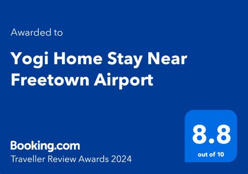 Palkinto, sertifikaatti, kyltti tai muu asiakirja, joka on esillä majoituspaikassa Yogi Home Stay Near Freetown Airport