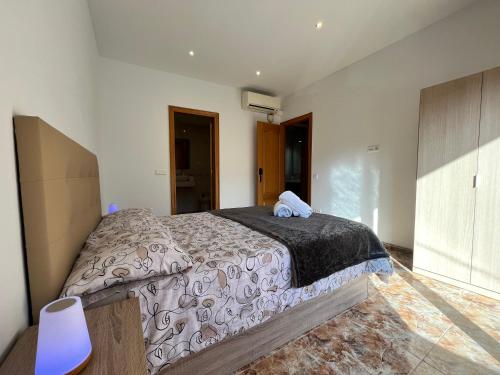 Ένα ή περισσότερα κρεβάτια σε δωμάτιο στο Amplio Apartamento, 5 camas