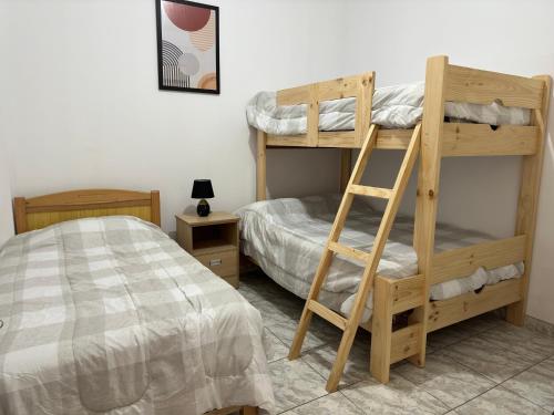 Postel nebo postele na pokoji v ubytování Morada Apart