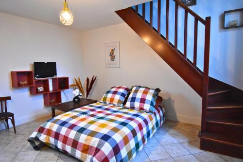Posteľ alebo postele v izbe v ubytovaní Tour Pleyel - Duplex Lumineux