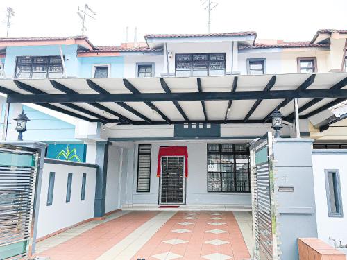 a pergola over the front door of a house at Bukit Indah, Pool Table, 16Pax, 5 min to Aeon mall in Johor Bahru