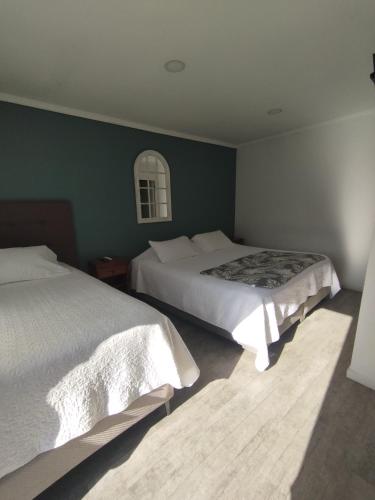Cama o camas de una habitación en HOSTAL LA MODERNA
