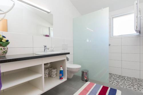 Kúpeľňa v ubytovaní Apartments Glorija