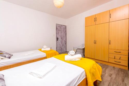 Postel nebo postele na pokoji v ubytování Apartment Nikola