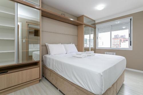 מיטה או מיטות בחדר ב-WI-FI 600mb | 500m da UFSC #TRINA02
