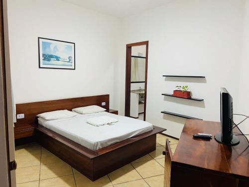 Postel nebo postele na pokoji v ubytování Hotel Pousada Canoa Quebrada
