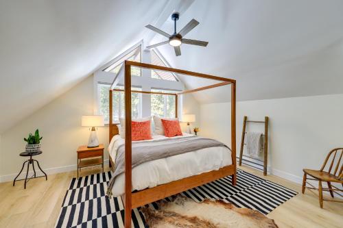 a bedroom with a canopy bed and a ceiling fan at Spacious Black Hawk Home with Deck and Mountain Views! in Black Hawk