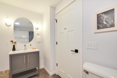 a bathroom with a sink and a mirror and a shower at The Linden, large & luxurious Galena escape! in Galena