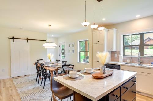a kitchen and dining room with a table and chairs at The Linden, large & luxurious Galena escape! in Galena