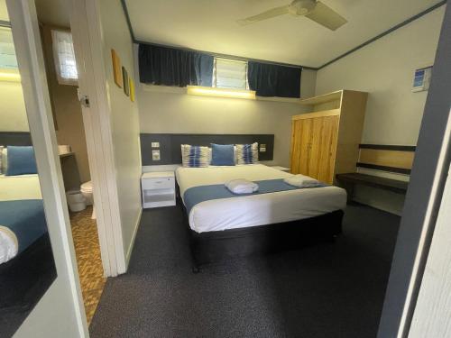 Postel nebo postele na pokoji v ubytování Arkana Motel