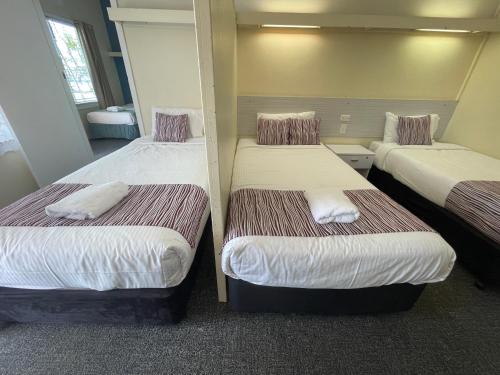 Postel nebo postele na pokoji v ubytování Arkana Motel