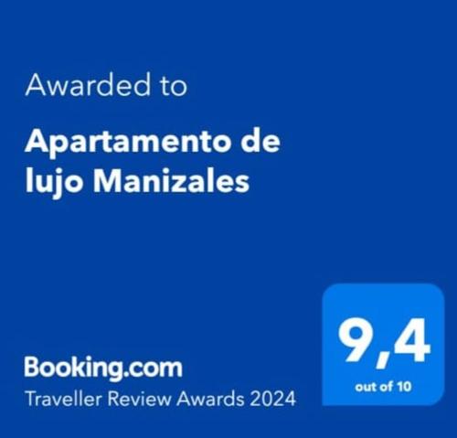 馬尼薩萊斯的住宿－Apartamento de lujo Manizales，蓝色的标语,写有toarmaarma de ubico手册