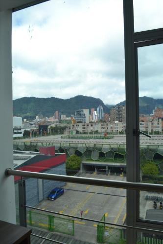 a view from a window of a parking lot at Hotel Royal Cid Bogota in Bogotá