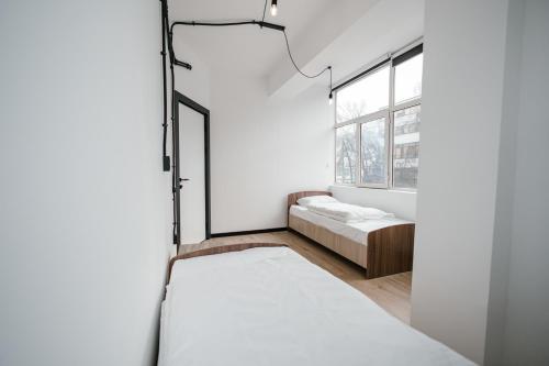 Postel nebo postele na pokoji v ubytování 68 Hostel