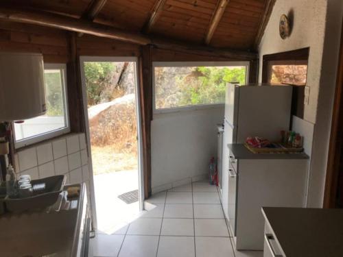 Køkken eller tekøkken på Maison de vacances dans village AUTHENTIQUE Corse