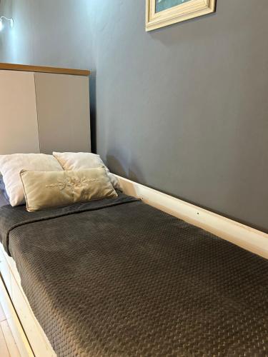 Een bed of bedden in een kamer bij Complejo Lupita, cabañas y turismo