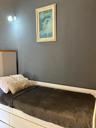 Een bed of bedden in een kamer bij Complejo Lupita, cabañas y turismo