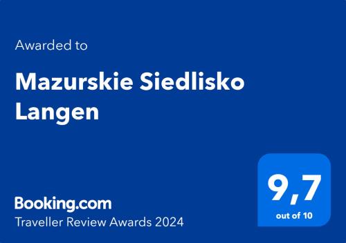 a blue sign with the words masksville steelislico tavern at Mazurskie Siedlisko Langen in Mrągowo
