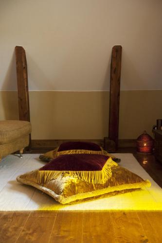a bedroom with two beds in a room at Ulfsunda Slott in Stockholm