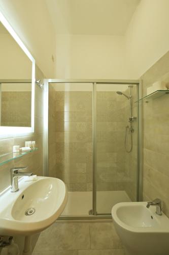 Koupelna v ubytování Hotel Delfino