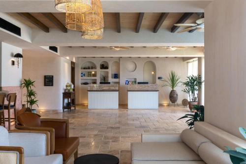 a lobby of a hotel with a living room at Radisson Blu Hotel, Kas in Kas