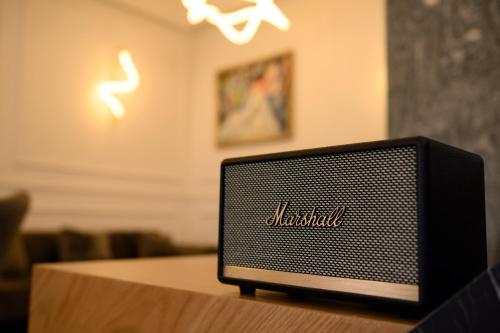 a television sitting on top of a table at Revive Boutique Hotel in Yerevan